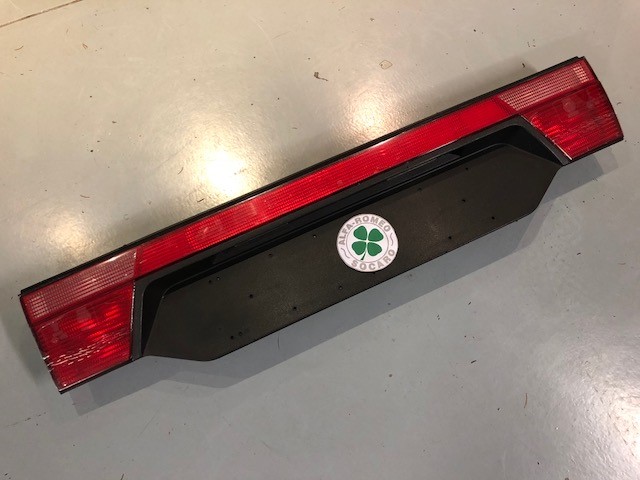 Bandeau feu arrière de coffre Alfa Romeo 155 60568444